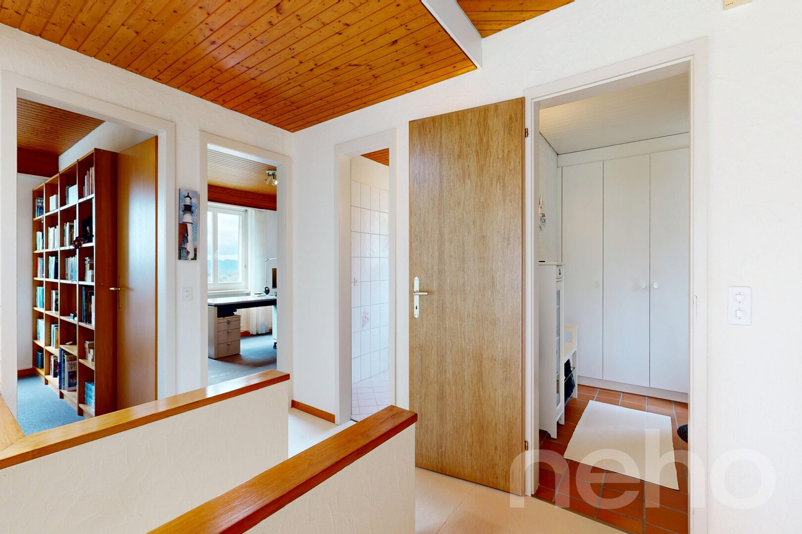 corridor featuring wood ceiling and light tile patterned floors