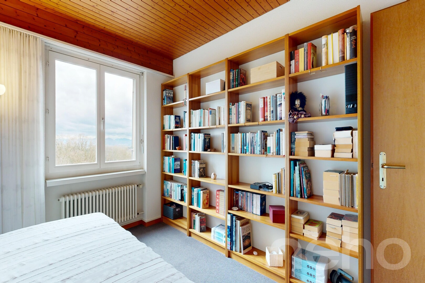 room / bedroom with radiator and light carpet