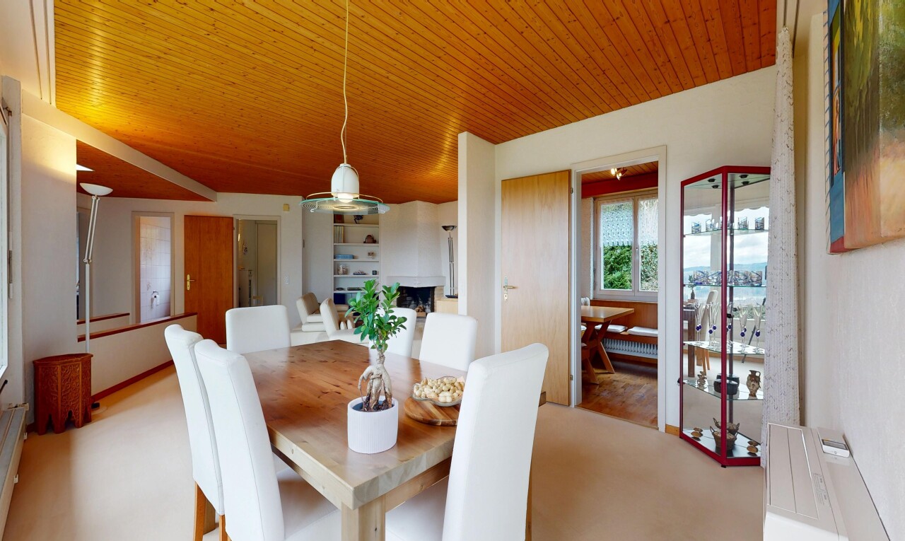 dining area featuring wood ceiling