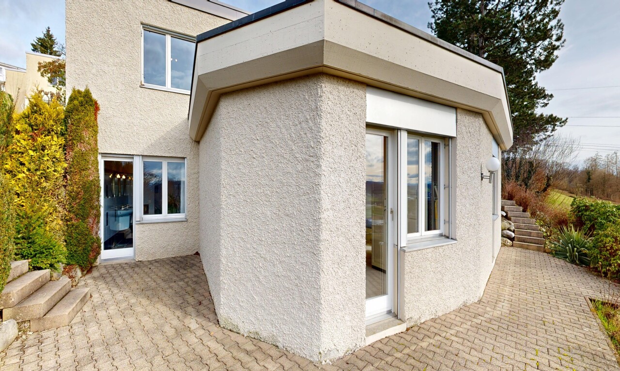 outdoor house featuring a patio and stucco siding