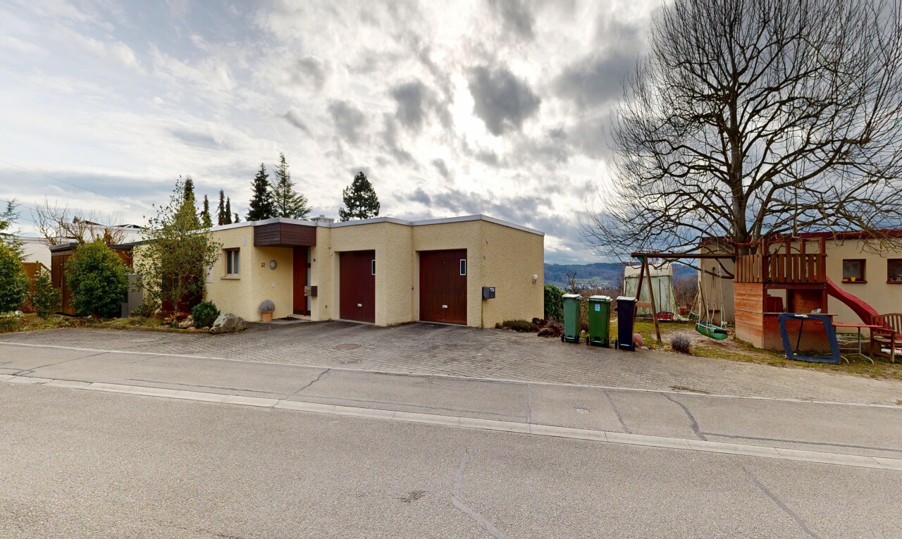 view of home featuring stucco siding and an attached garage