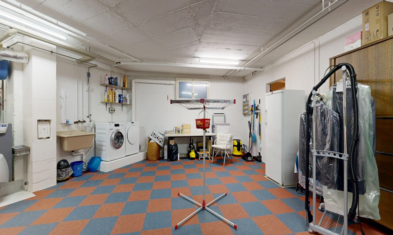 laundry area with washing machine and clothes dryer