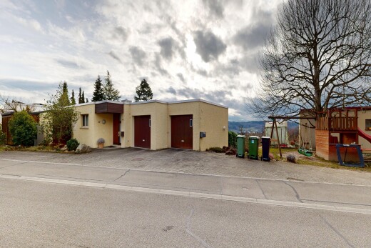 view of home featuring stucco siding and an attached garage