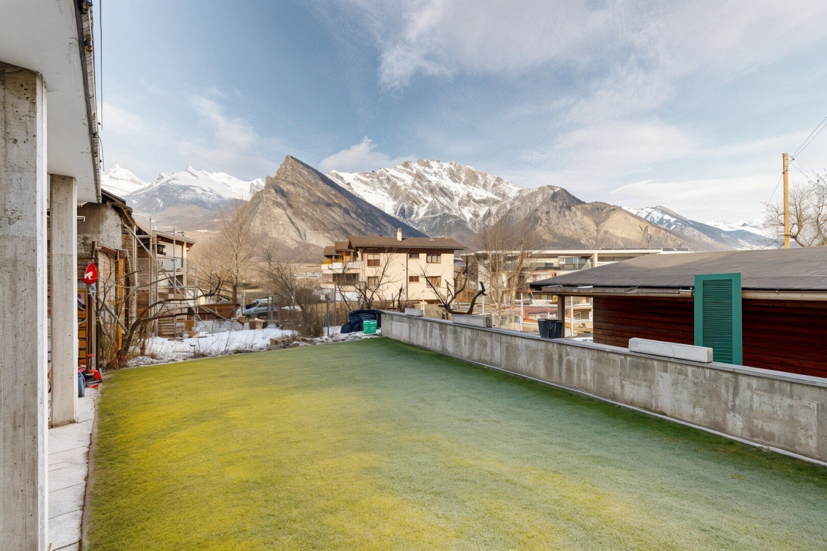 garden featuring a mountain view and a lawn
