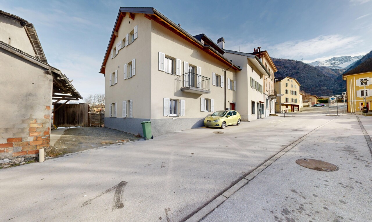 view of building exterior featuring a mountain view