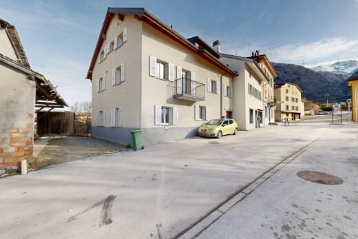 view of building exterior featuring a mountain view