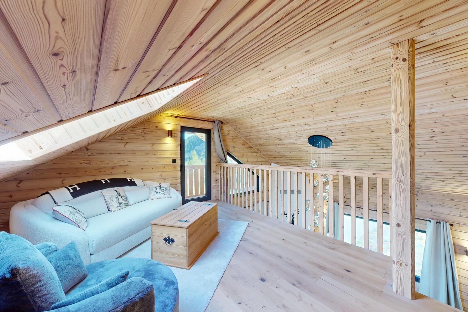 living area with wooden walls, a vaulted wood ceiling, and wood finished floors