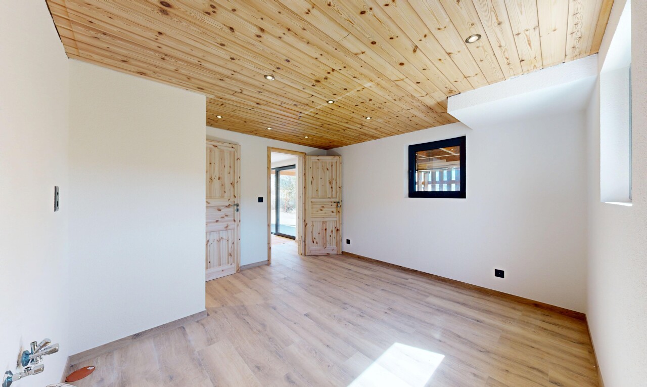 unfurnished room featuring light wood-type flooring, wooden ceiling, and recessed lighting
