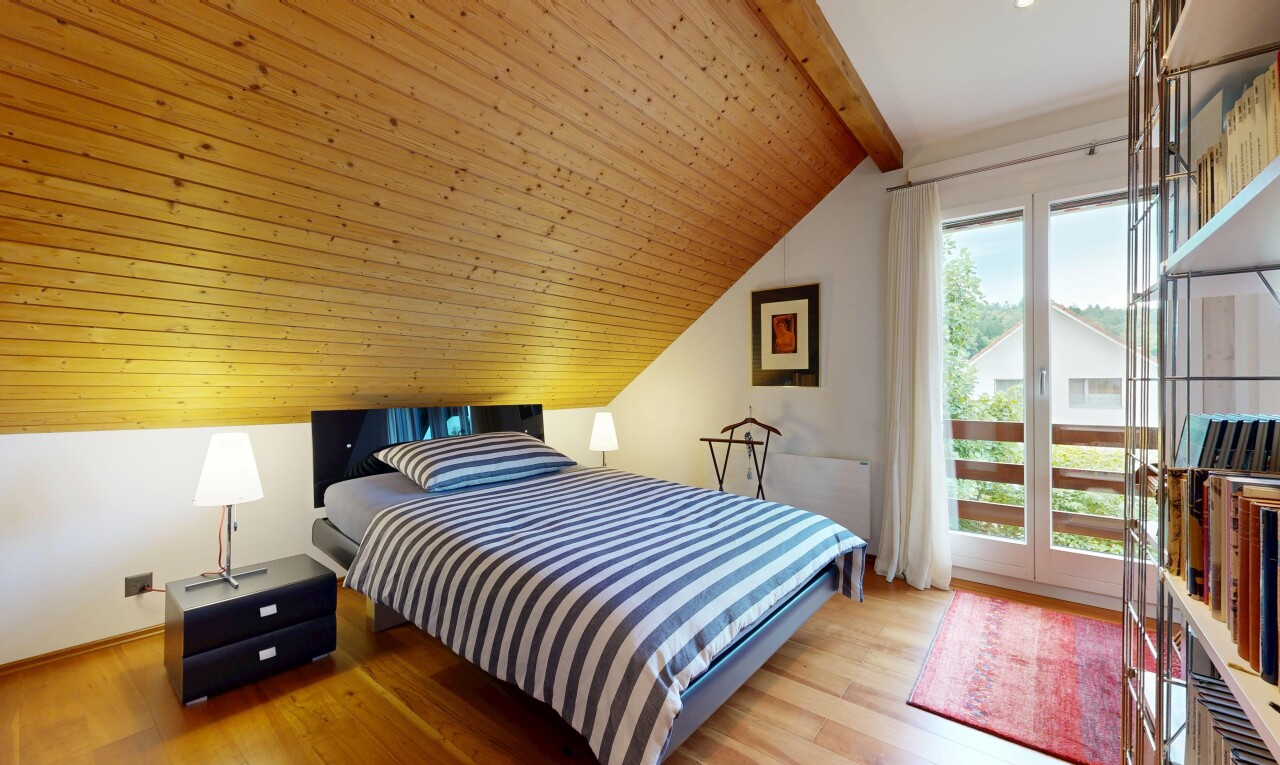 zimmer / schlafzimmer mit inside property, dachschräge, vaulted ceiling, gipskartonwand, und drywall