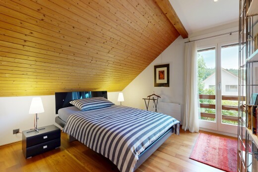 zimmer / schlafzimmer mit inside property, dachschräge, vaulted ceiling, gipskartonwand, und drywall