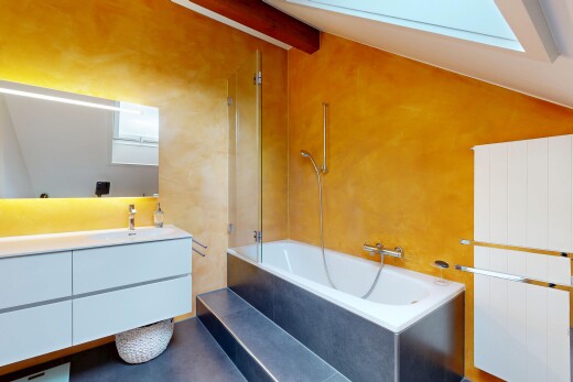 full bathroom featuring beam ceiling, vanity, and shower / washtub combination