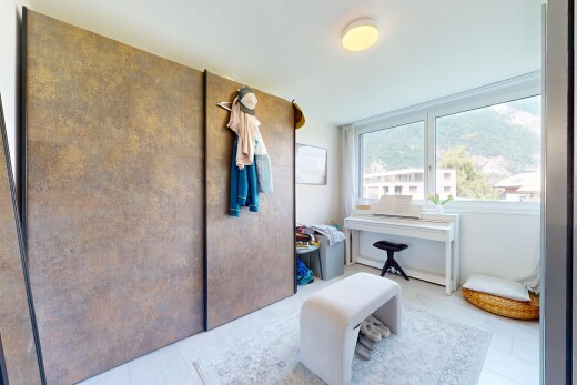 patio / terrace with a sunroom