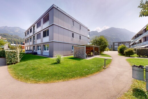 außenansicht mit blick auf die berge, mountain view, und property visible