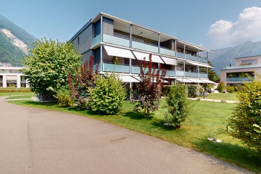view of building exterior featuring a mountain view