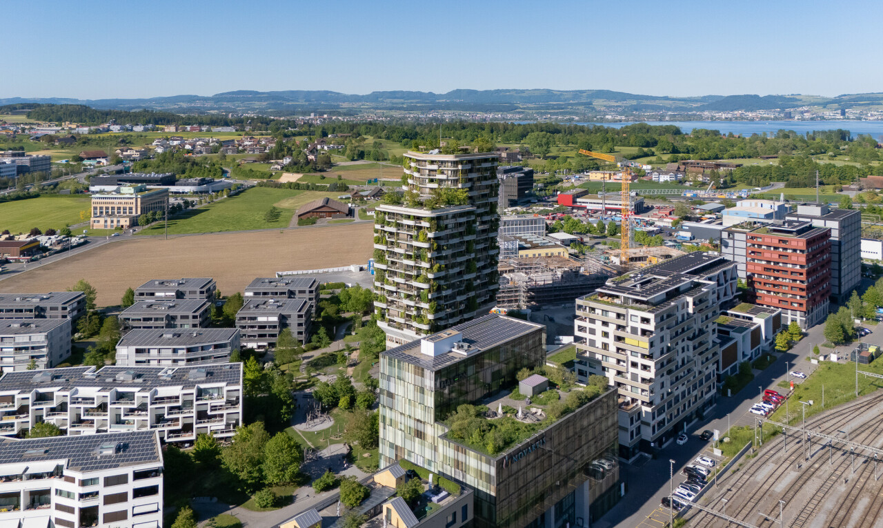 extérieur du bâtiment avec day time, aerial view, mountain view, vue sur la montagne, et city view