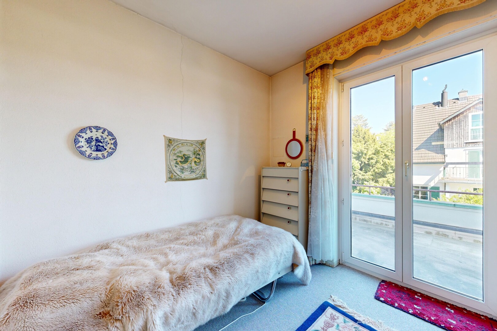 room featuring carpet floors and access to exterior