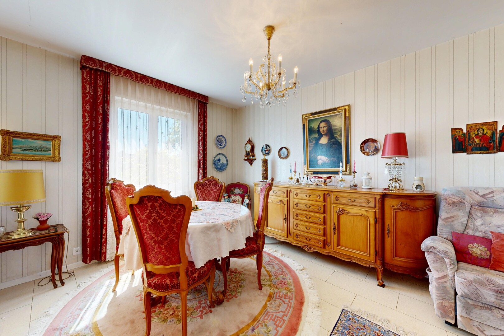 dining space featuring hanging lights and light tile patterned flooring