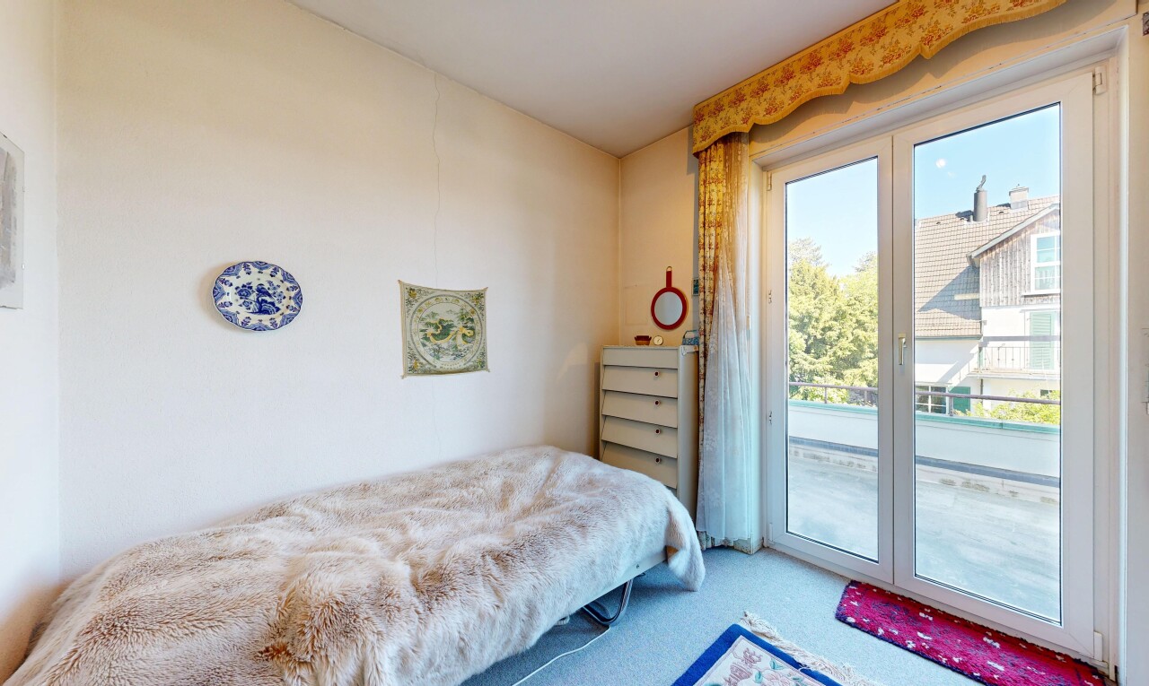 room featuring carpet floors and access to exterior