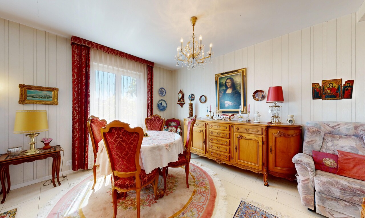 dining space featuring hanging lights and light tile patterned flooring