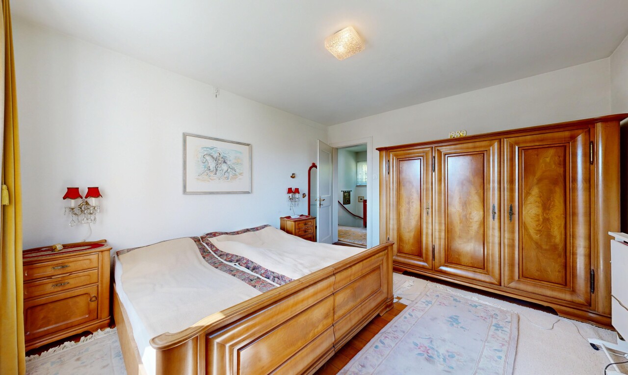 room / bedroom with light wood-style flooring