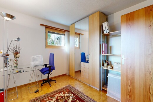 office space with parquet flooring and baseboards