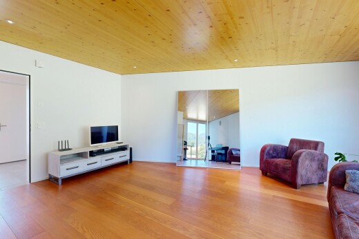 living room with wood ceiling and light wood-type flooring