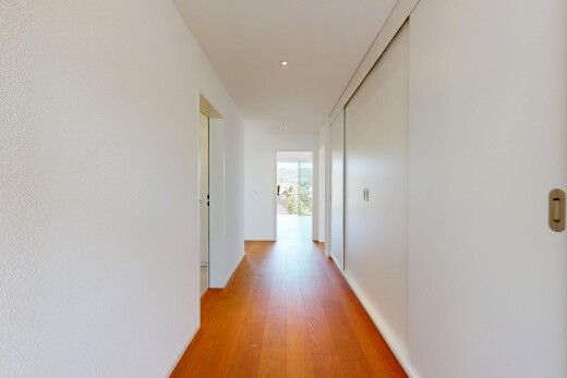 hallway featuring light wood-type flooring