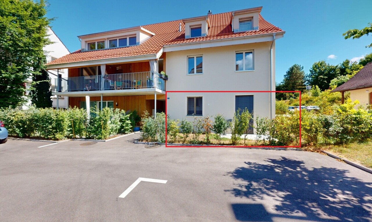 außenansicht mit dachgaube, day time, property visible, parkplatz, und stuckverkleidung