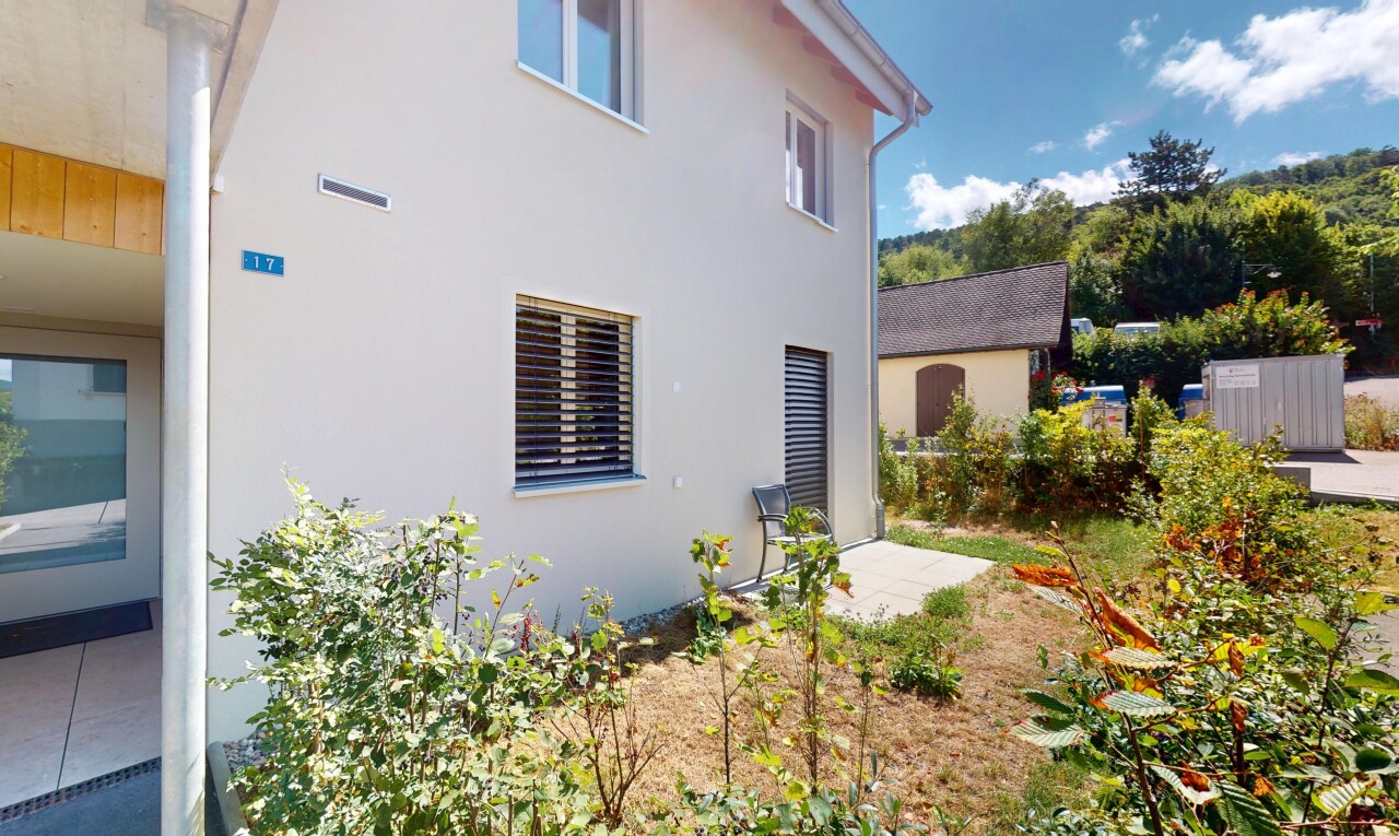 außenansicht mit property visible, stuckverkleidung, und day time