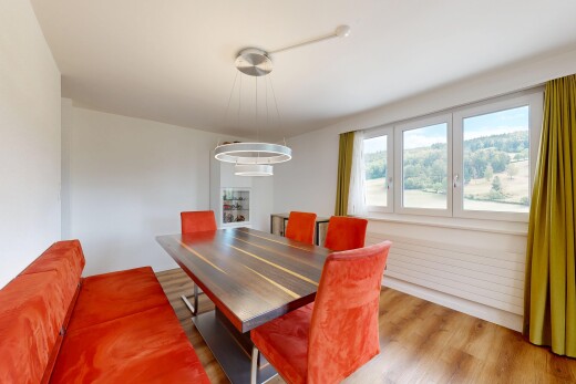 dining area featuring light wood finished floors