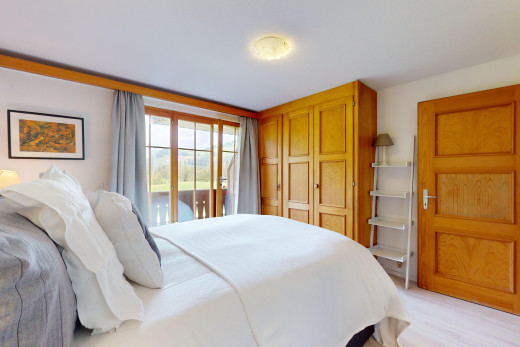 chambre avec inside property, natural light, lumière naturelle, drywall, et cloison sèche
