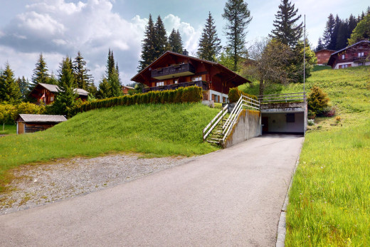 außenansicht mit auffahrt, treppen, und property visible