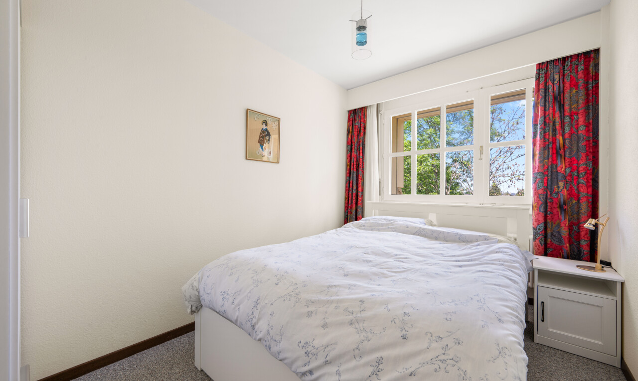 chambre avec carpet, moquette, inside property, drywall, et cloison sèche