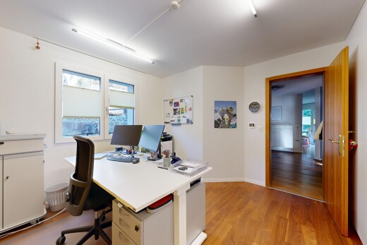 home office with light wood-type flooring