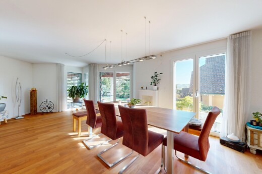 dining room featuring light wood-style floors and access to exterior