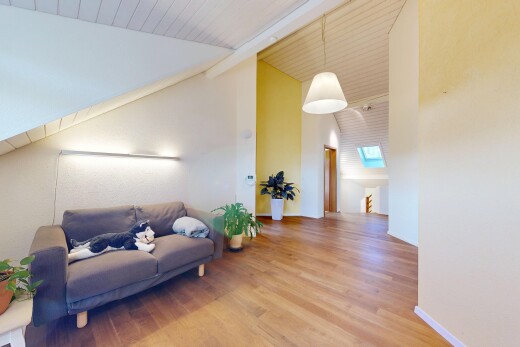 living area featuring light wood-style floors, pendant lighting, and a vaulted wood ceiling