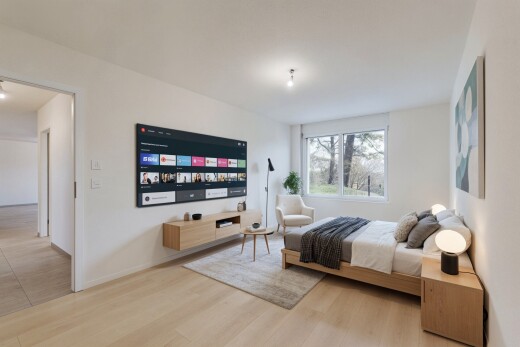 zimmer / schlafzimmer mit inside property, drywall, gipskartonwand, wood finish floor, und holzfußboden