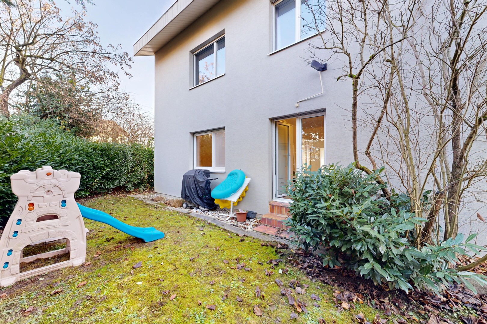 außenansicht mit spielplatz, rasen, from property, und stuckverkleidung