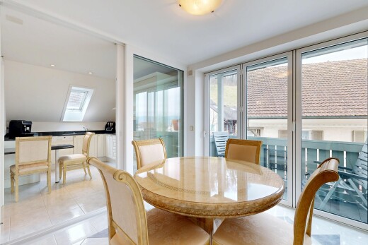 dining space featuring light tile patterned floors