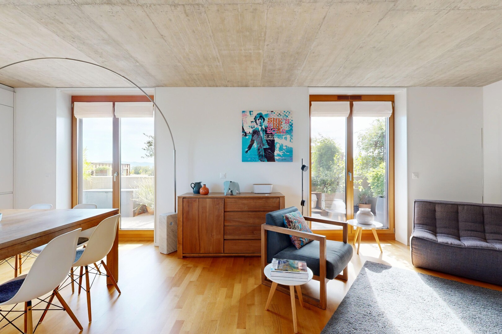 living / dining area with light wood-style floors