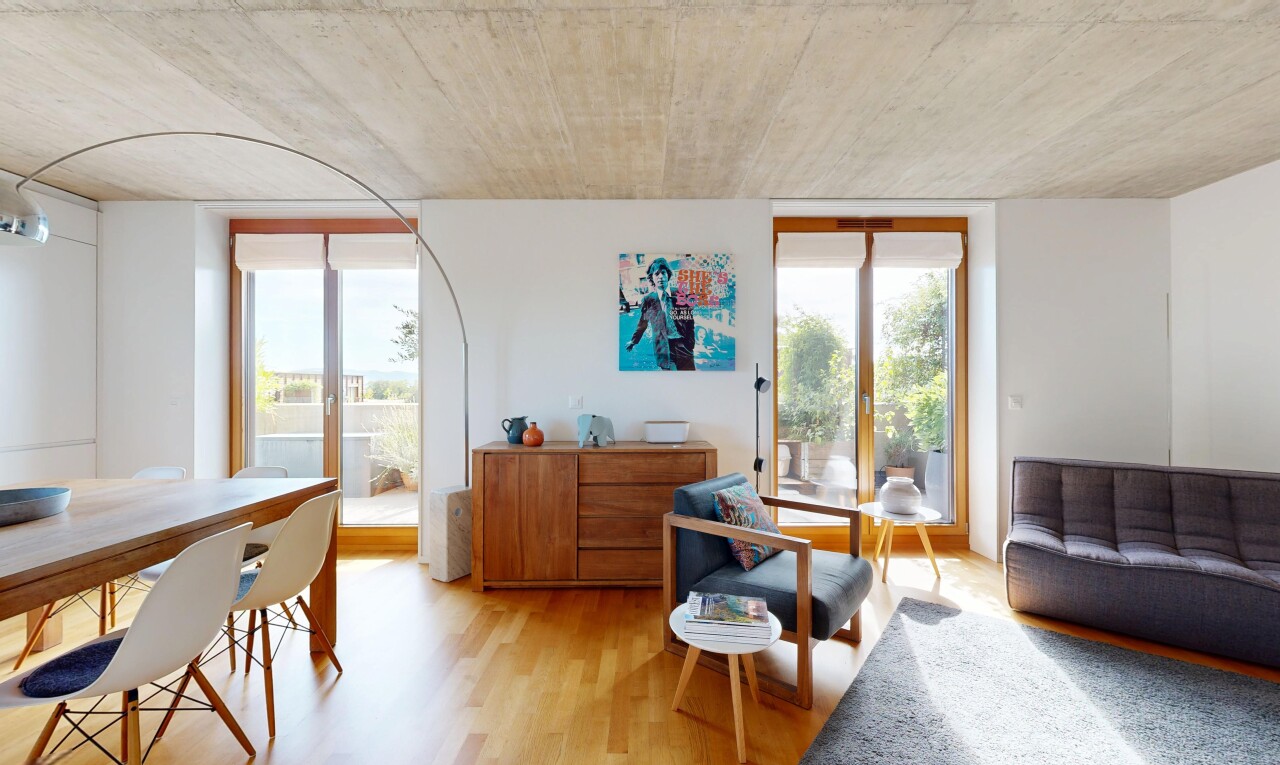 living / dining area with light wood-style floors