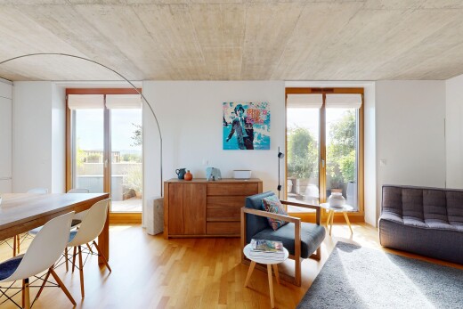 living / dining area with light wood-style floors