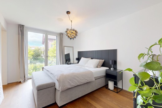 chambre avec sol en finition bois, wood finish floor, cloison sèche, drywall, et inside property