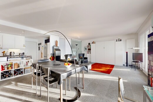 salon / salle à manger avec inside property, télévision, drywall, cloison sèche, et carpet