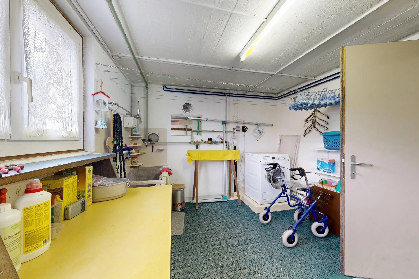 laundry area with washer / dryer