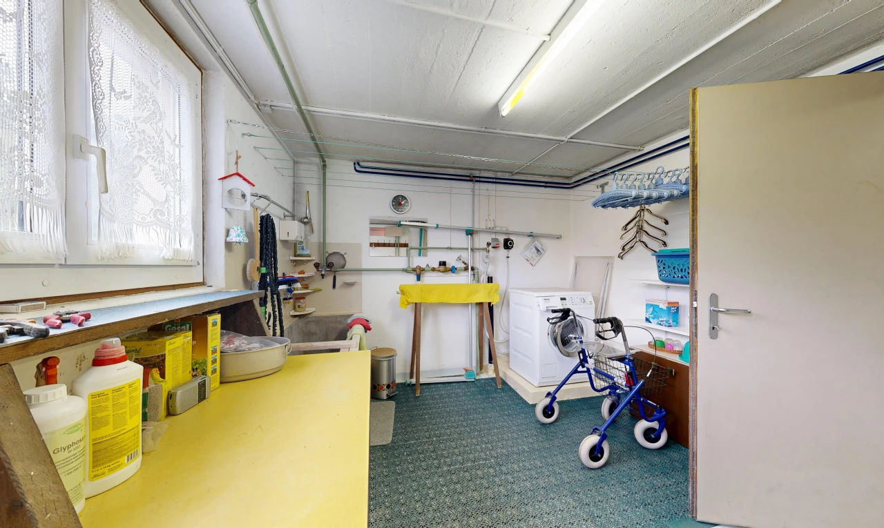 laundry area with washer / dryer