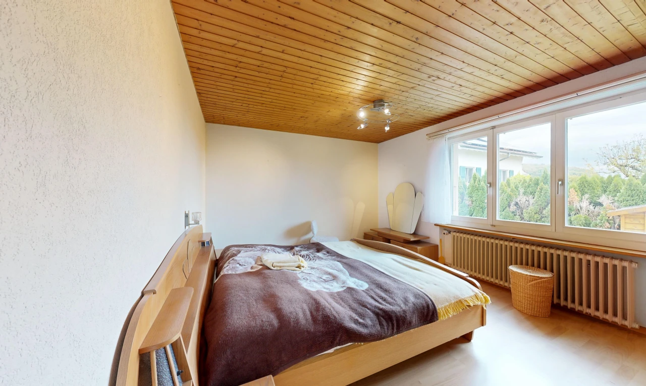 room / bedroom featuring wood ceiling and radiator