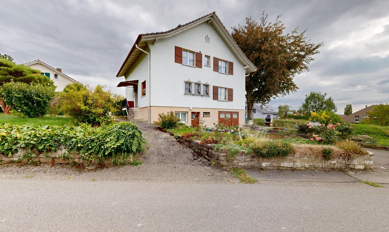 outdoor house with stucco siding