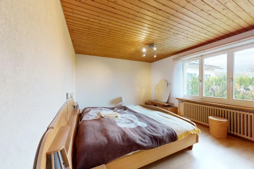 room / bedroom featuring wood ceiling and radiator