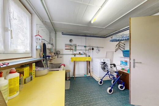 laundry area with washer / dryer